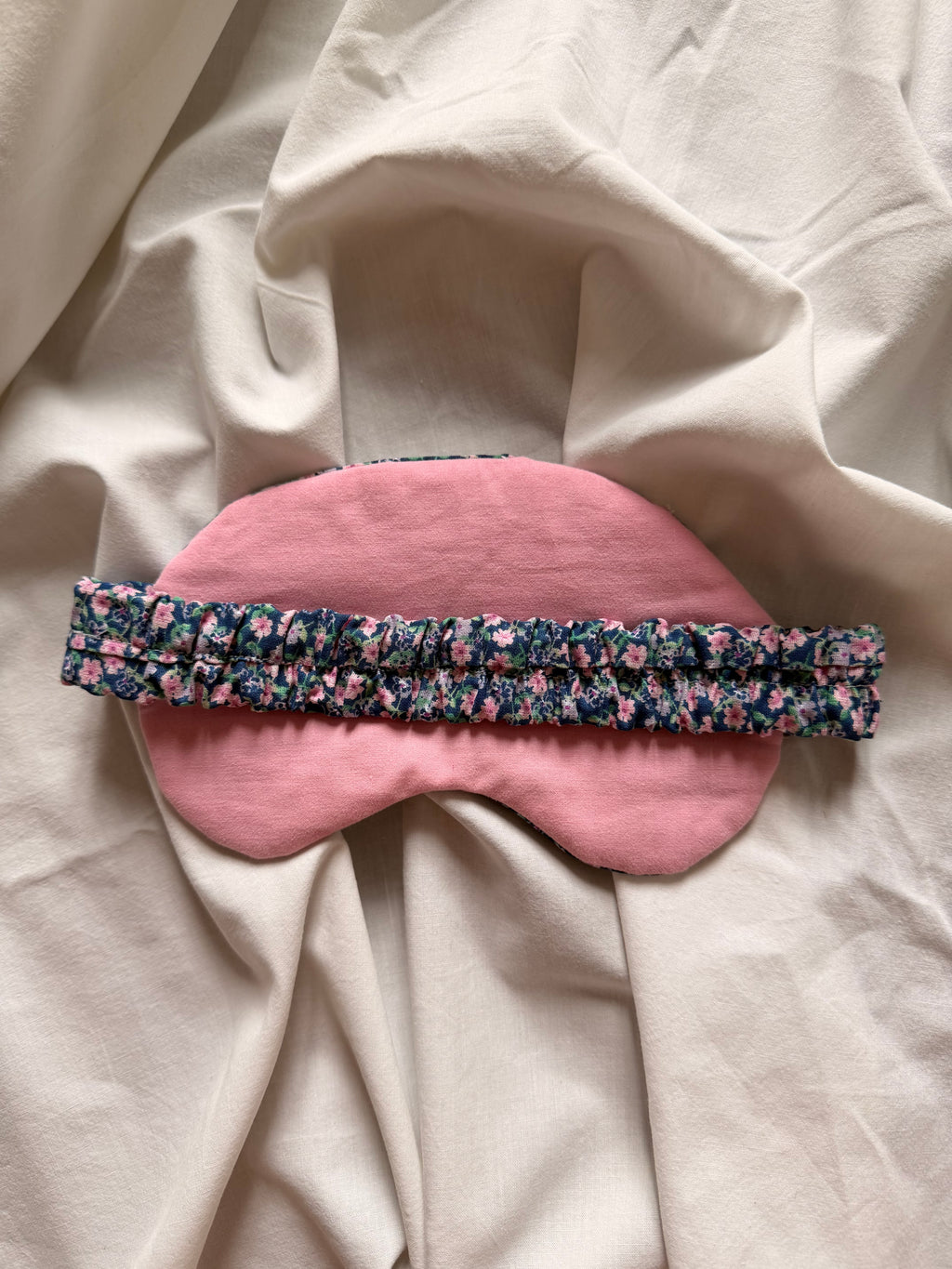 Masque de nuit fleuri rose