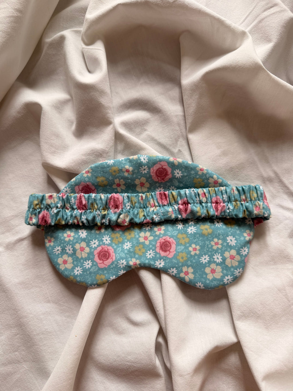 Masque de nuit bleu et rose
