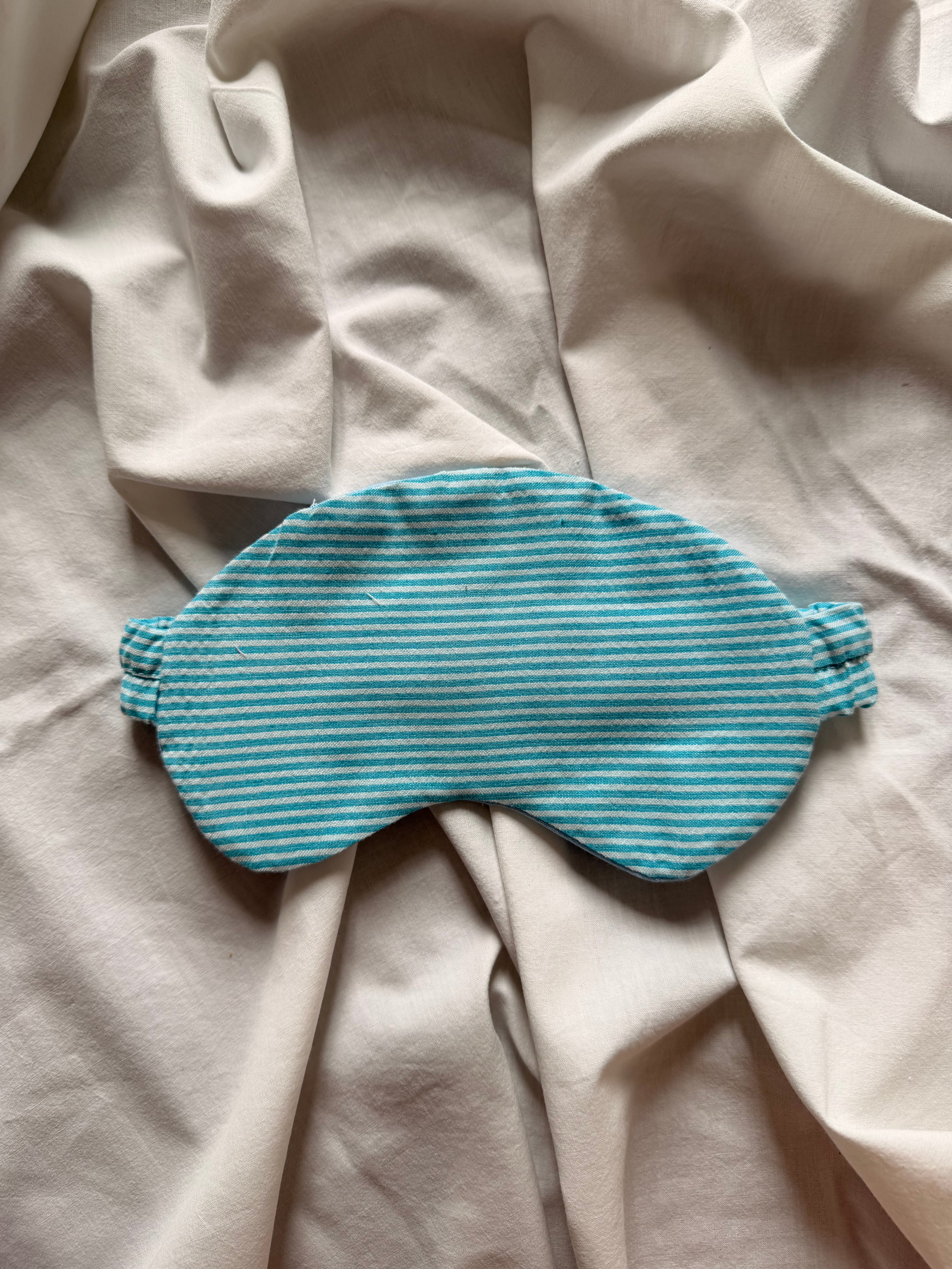 Masque de nuit bleu rayé