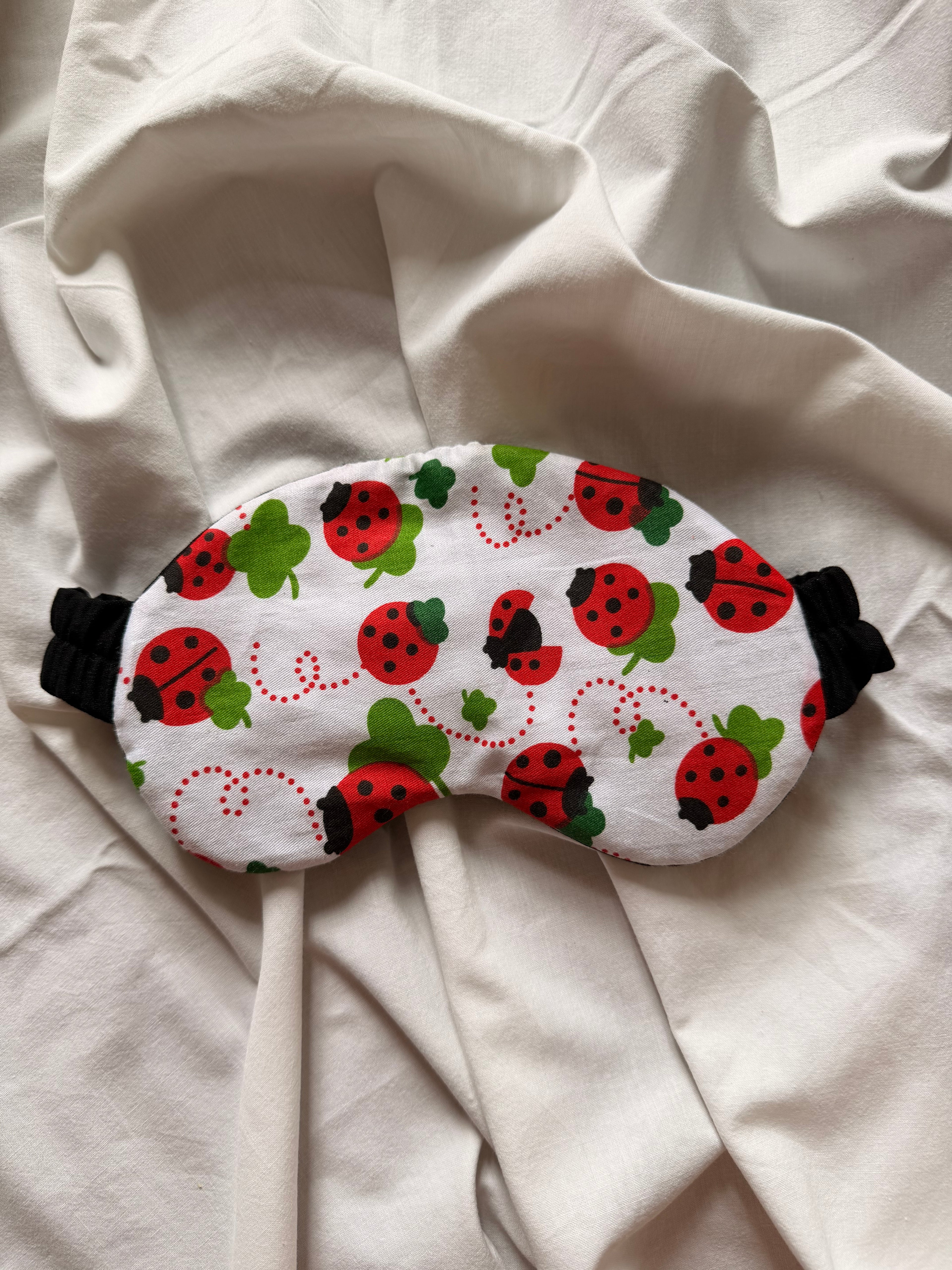 Masque de nuit coccinelle