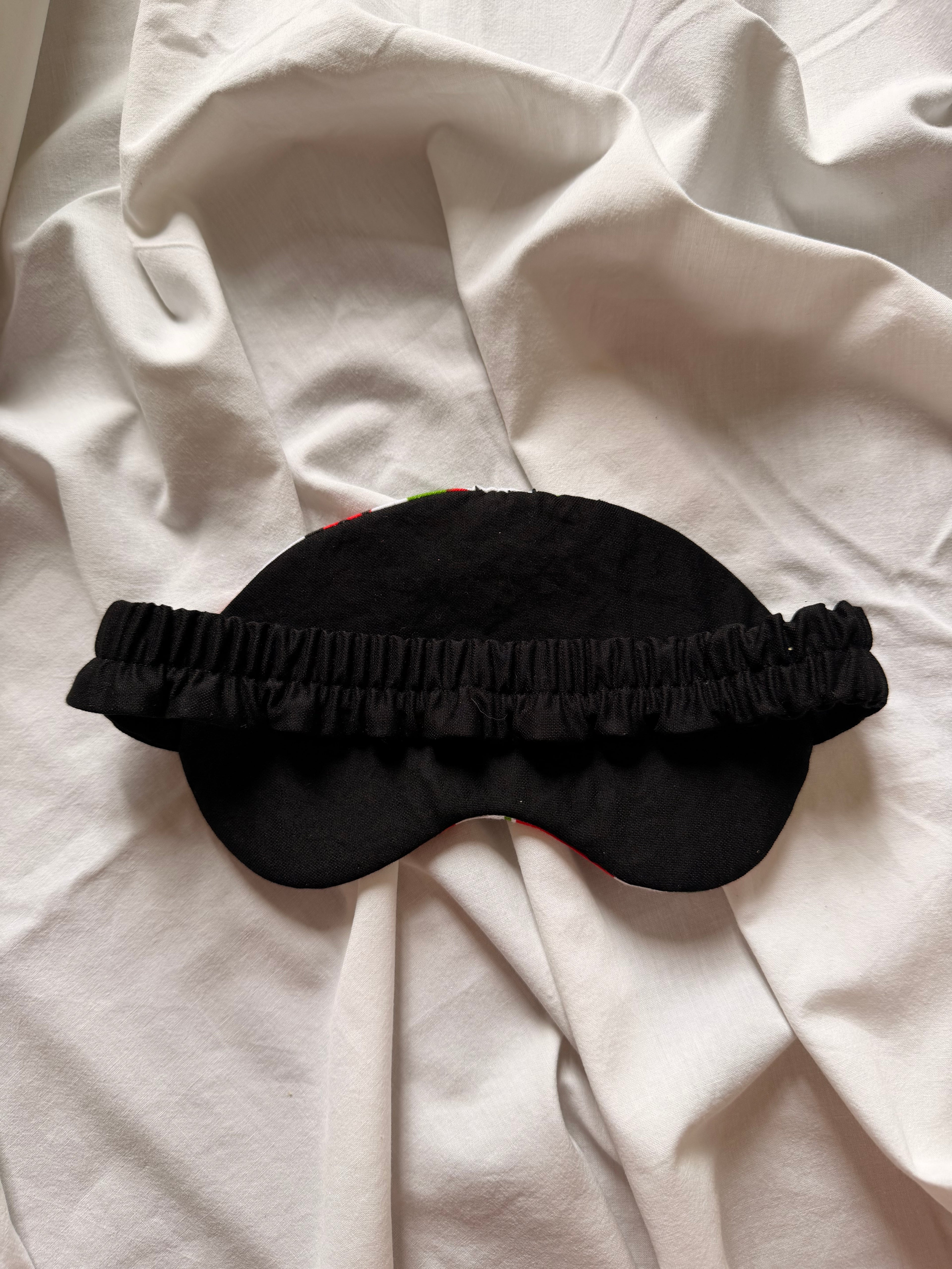 Masque de nuit coccinelle